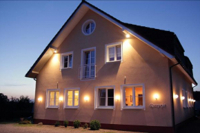 Noclegi Agape in Binowo